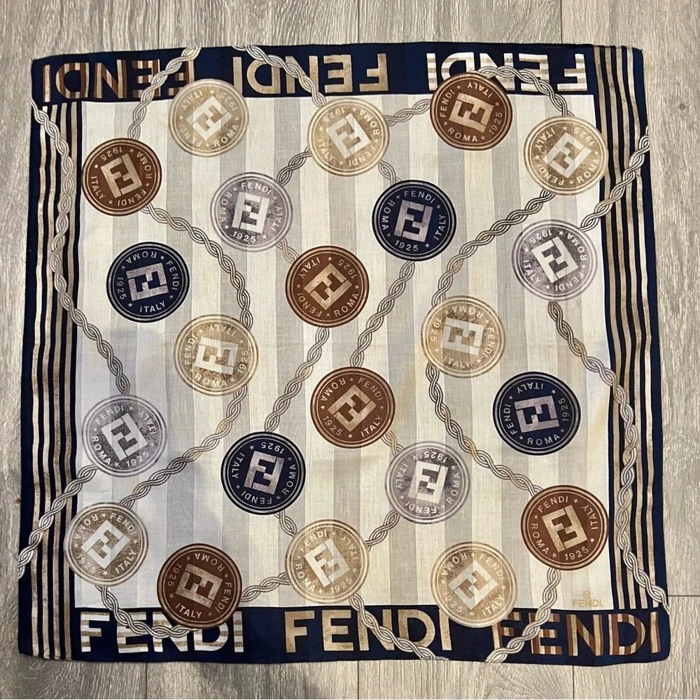 Fendi scarf 23 x 22.5” spend $400 get a free designer scarf valves at $400.